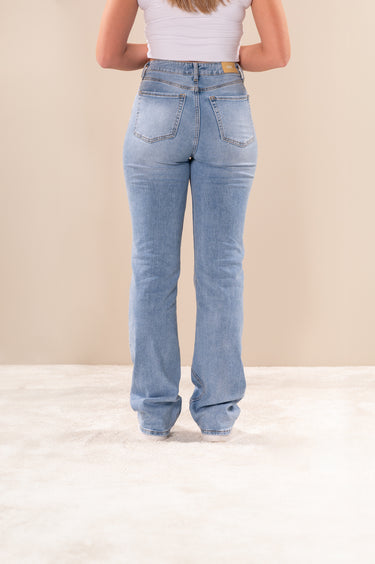 Lange jeans met gat